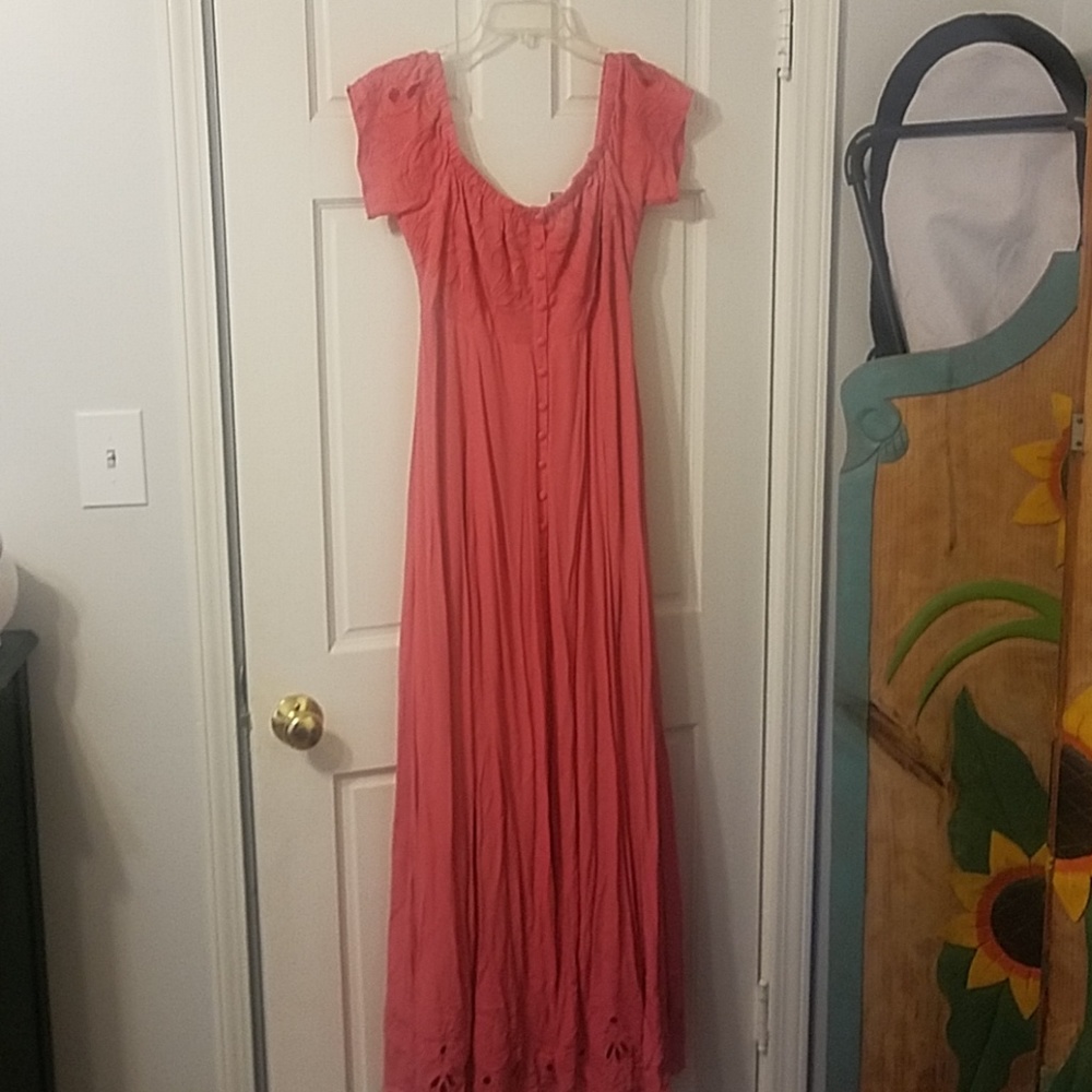 Long, off- or on-shoulder coral maxi dress